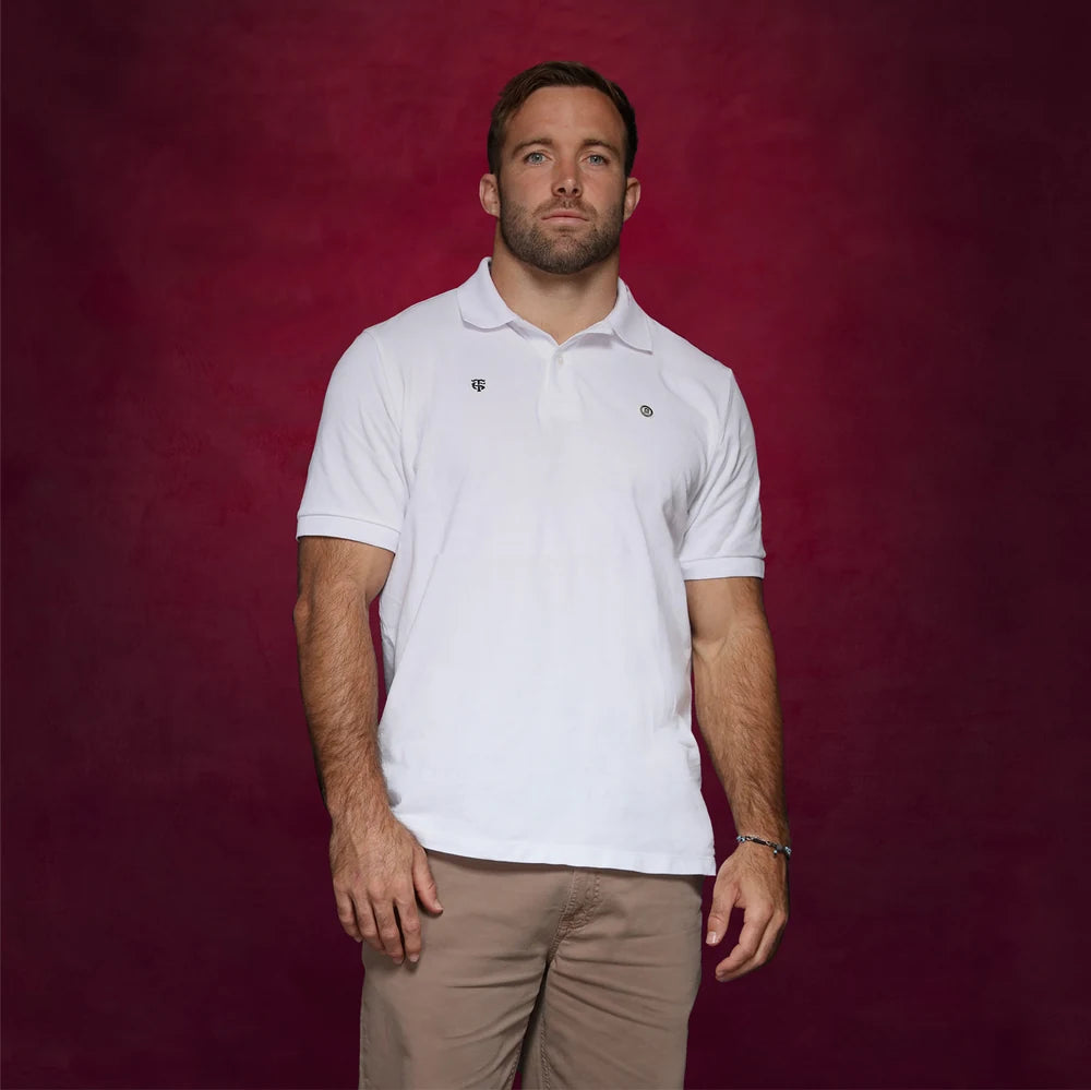 Polo blanc Stade Toulousain x SERGE BLANCO porté