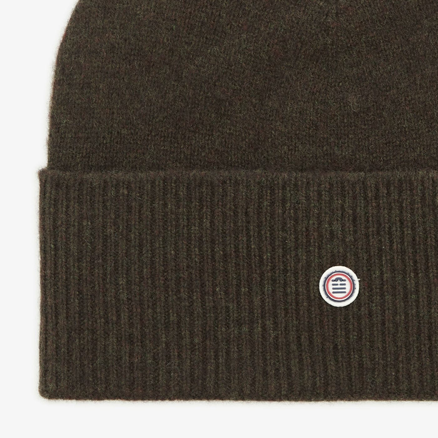 Beanie olann simplí aoilghlas d'fhir, serge blanco