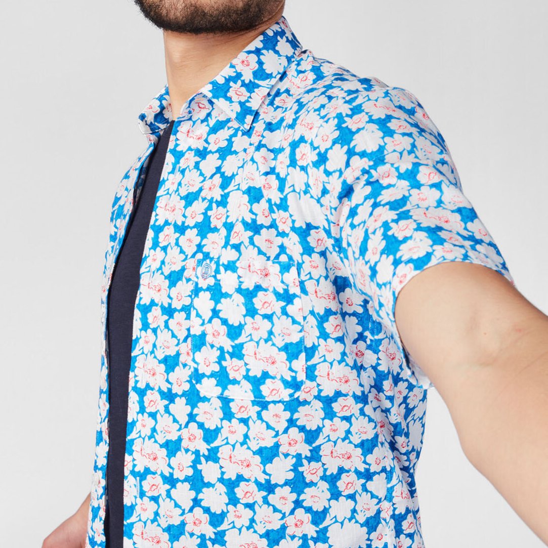 Chemise manches courtes bleue avec imprimé floral