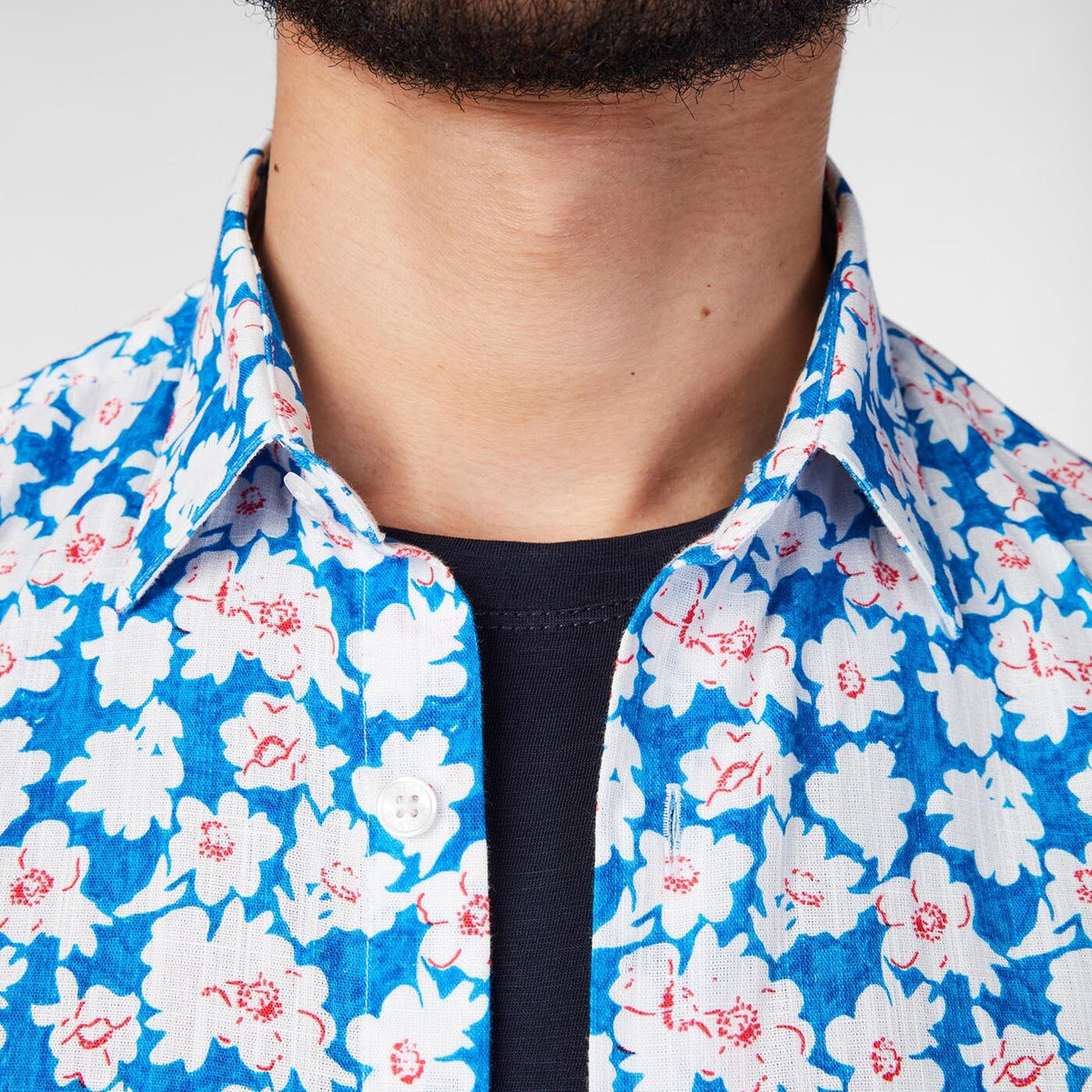 Chemise manches courtes bleue avec imprimé floral