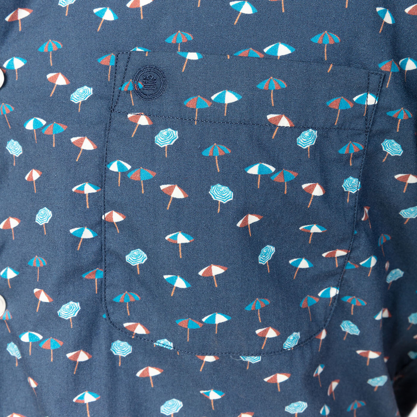 Chemise manches courtes bleu marine imprimé parasols