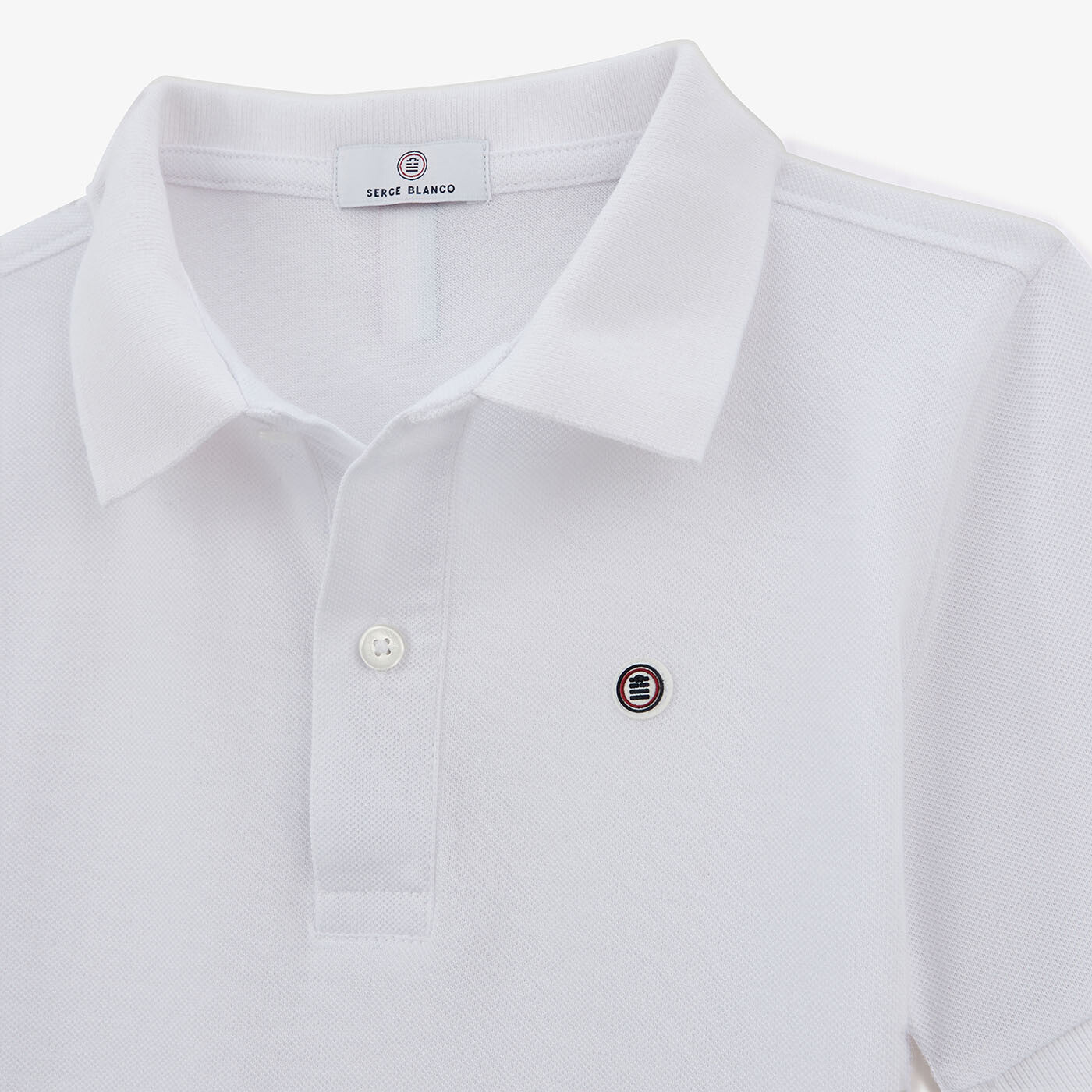 Polo Junior manches courtes en coton blanc