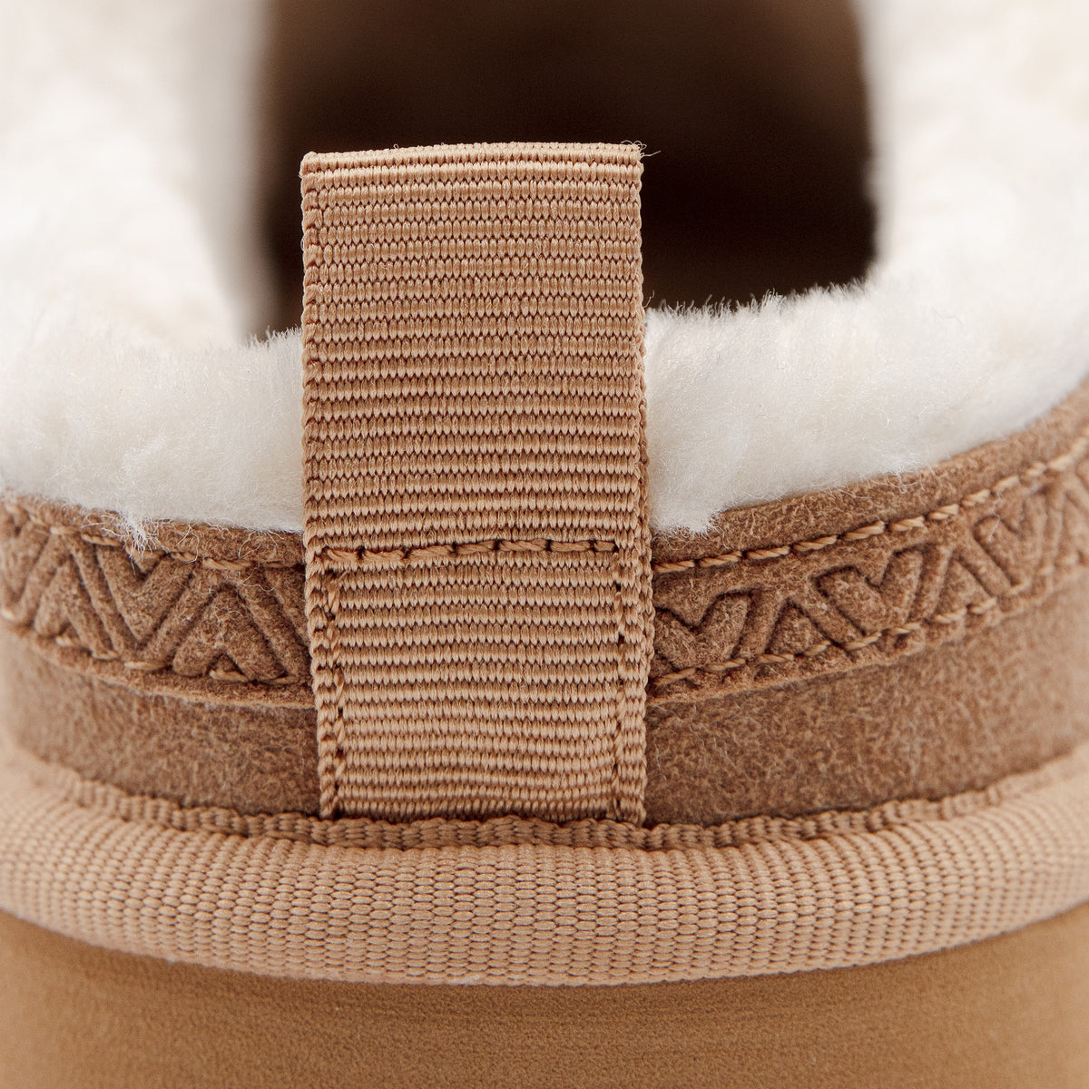 Camel-colored suede-like fur-lined mules