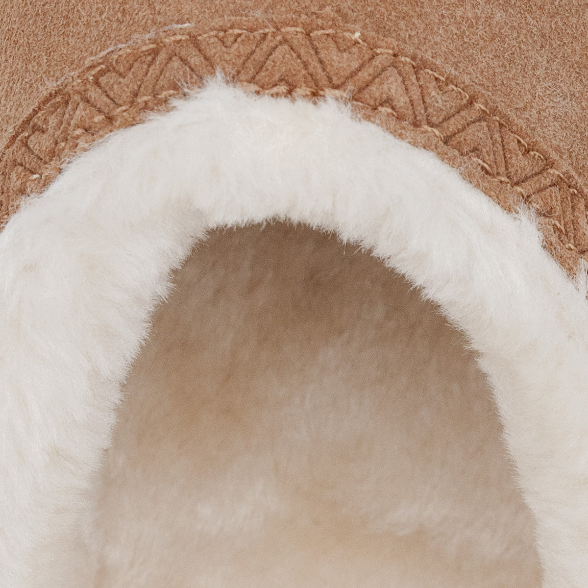 Camel-colored suede-like fur-lined mules
