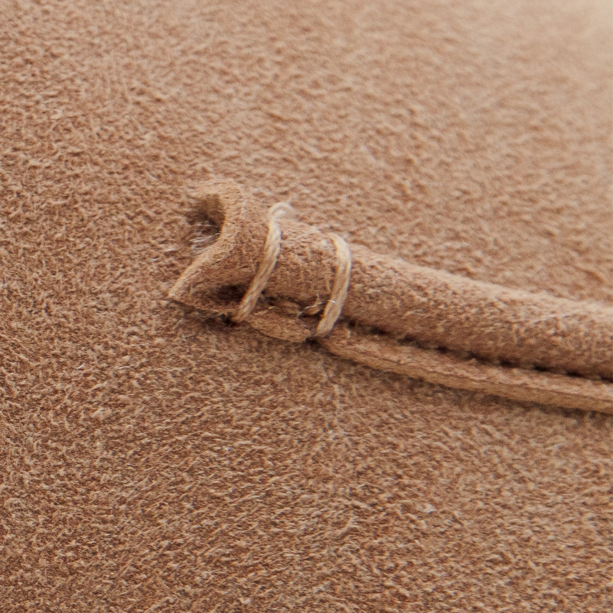 Camel-colored suede-like fur-lined mules