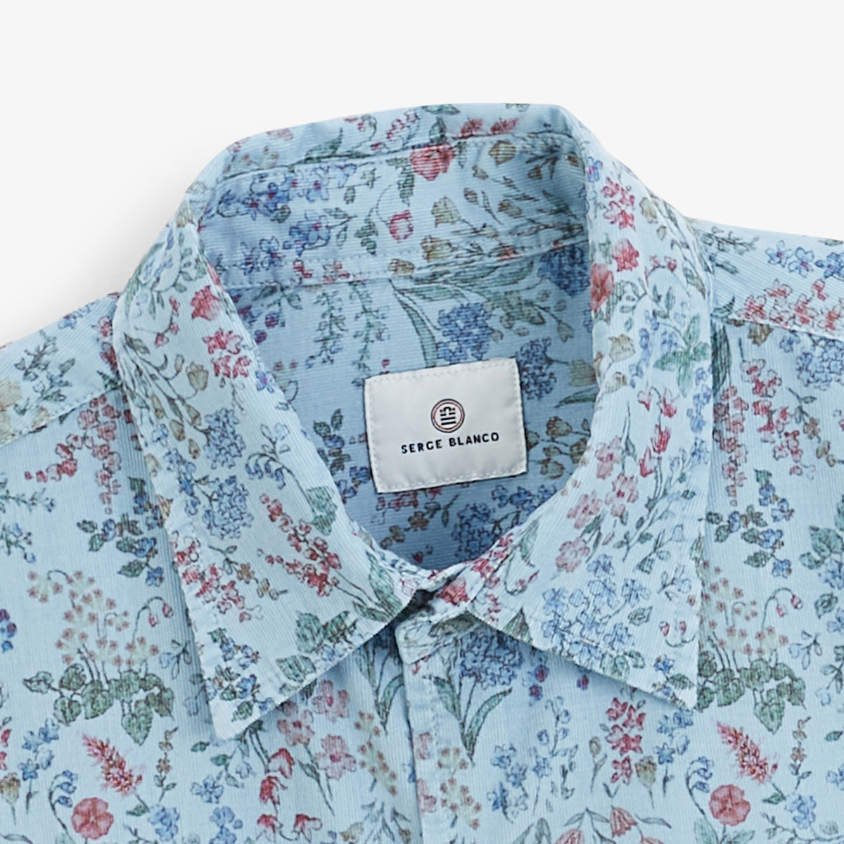 Chemise manches longues velours côtelé floral bleu