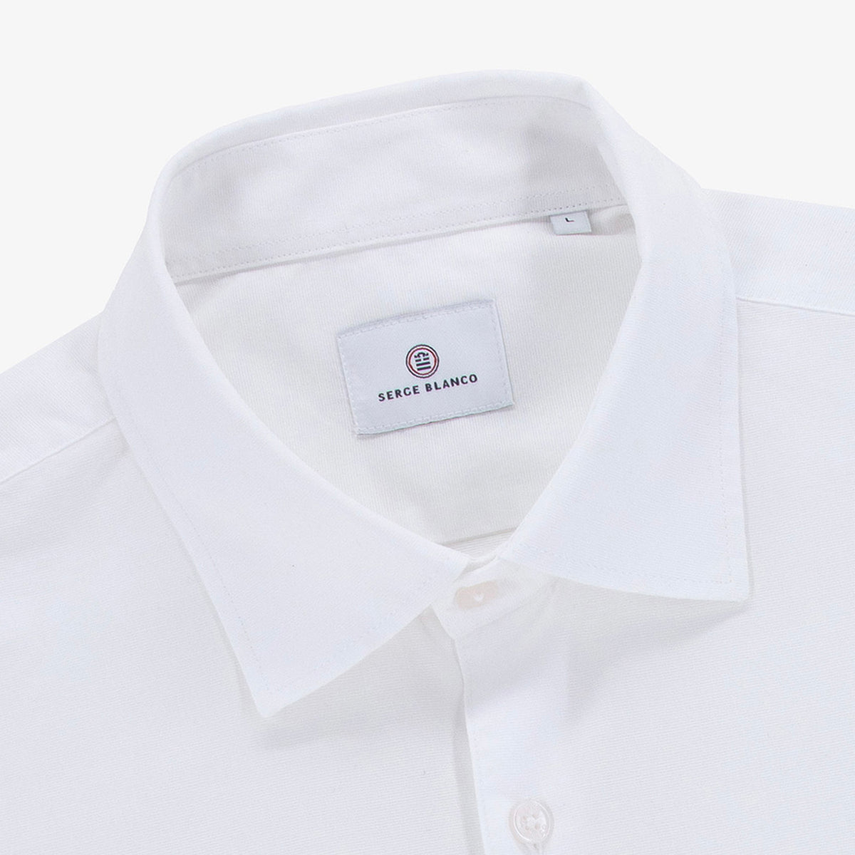 Chemise manches longues en coton blanc à col boutonné