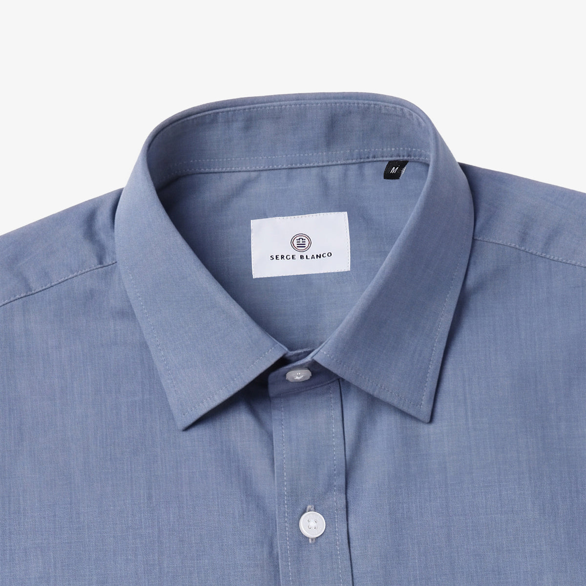 Camisa azul de algodón de manga larga con bolsillo en el pecho