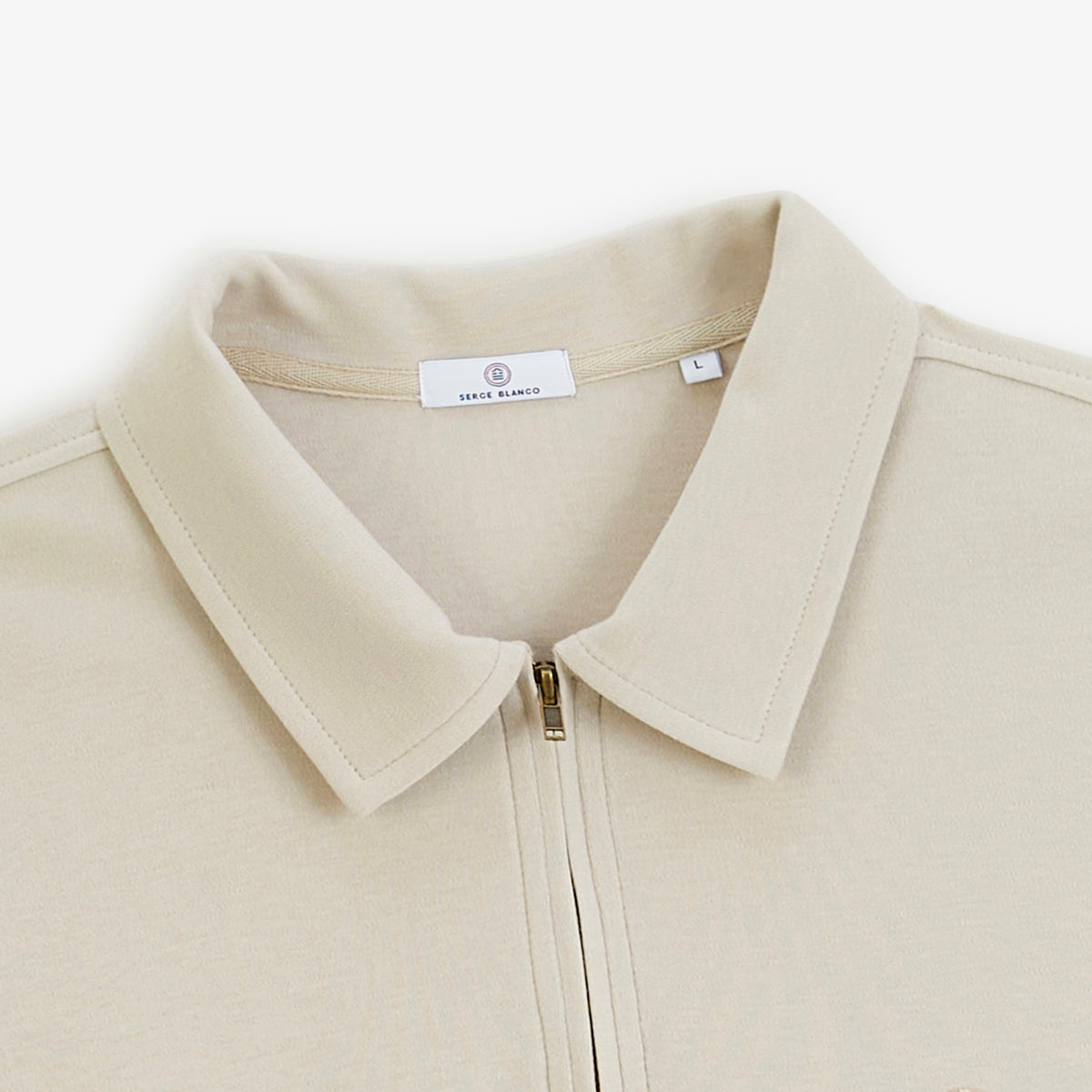 Polo zippé manches longues en coton interlock beige travertin