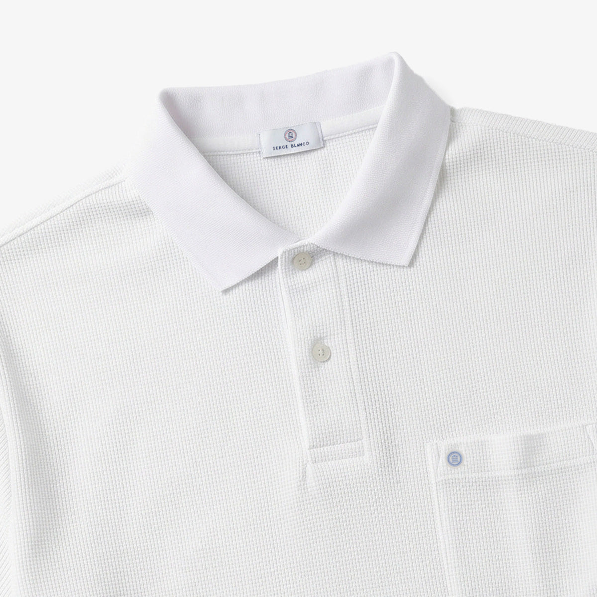 Polo manches courtes en coton gaufré blanc
