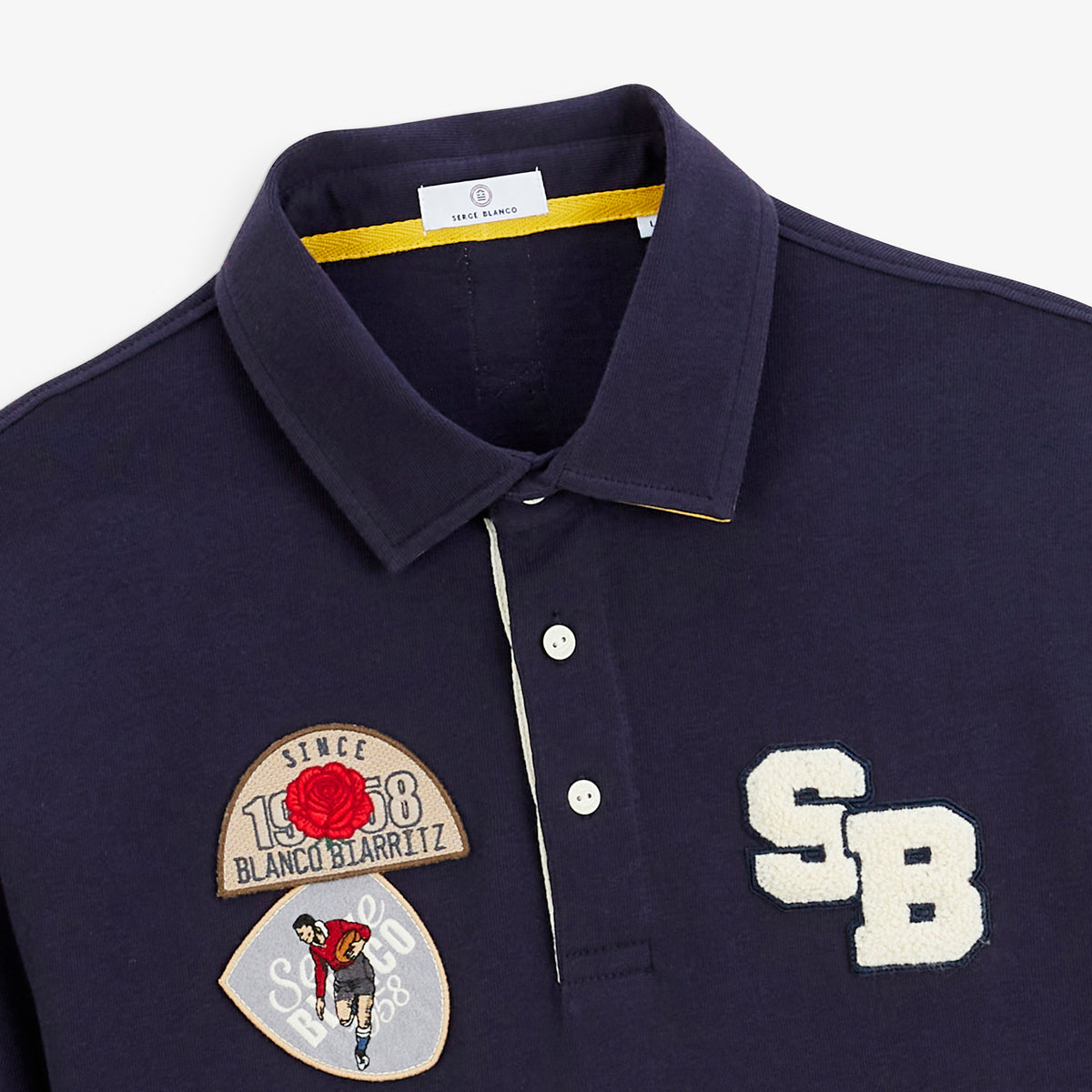 Polo de rugby manches longues badges brodés bleu marine