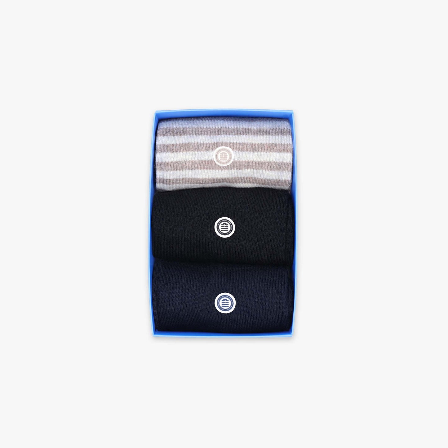 Pack of 3 pairs of solid black and blue socks and beige striped socks