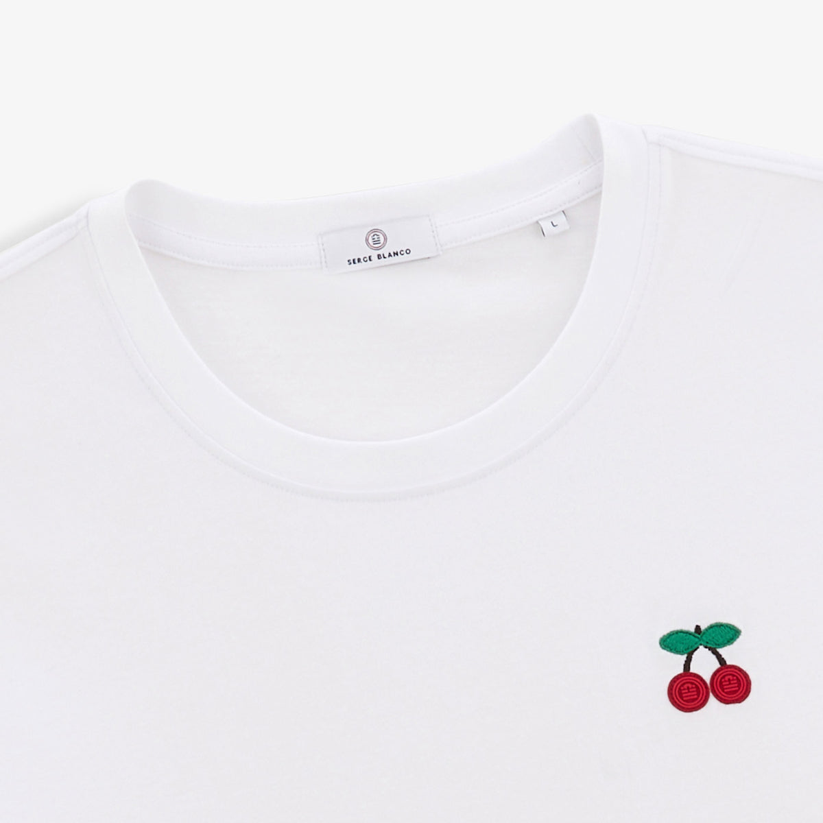 Tucker T-shirt with white cherry embroidery