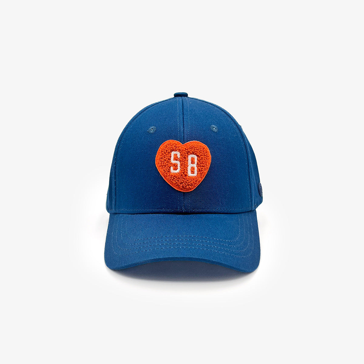 Casquette en coton avec badge coeur SB bleu opale serge blanco