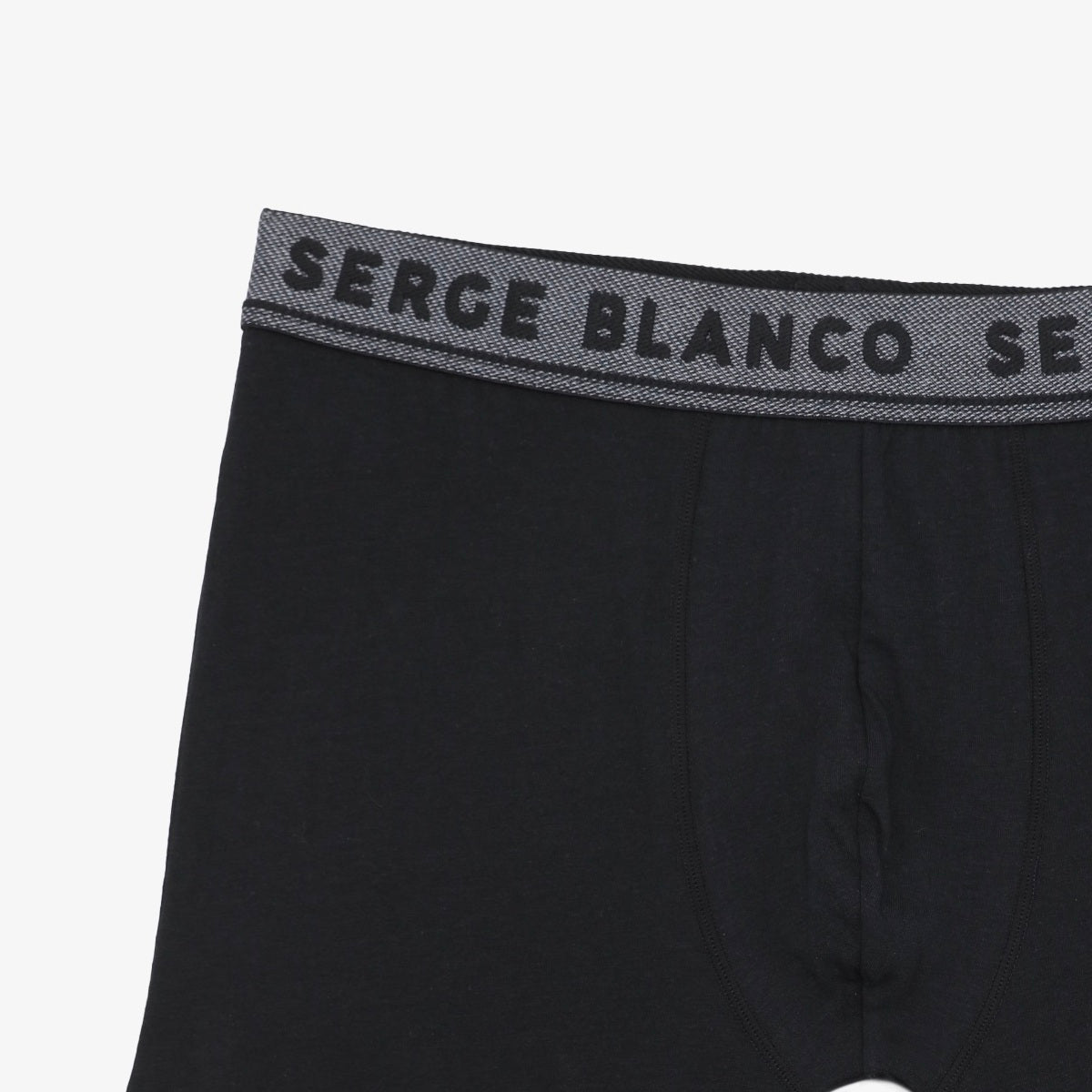 Détail du boxer noir SERGE BLANCO et de sa ceinture élastiquée siglée.