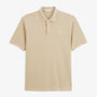 Polo piqué Lucas beige travertin SERGE BLANCO vu de face, à manches courtes, avec deux boutons blancs et logo poitrine.