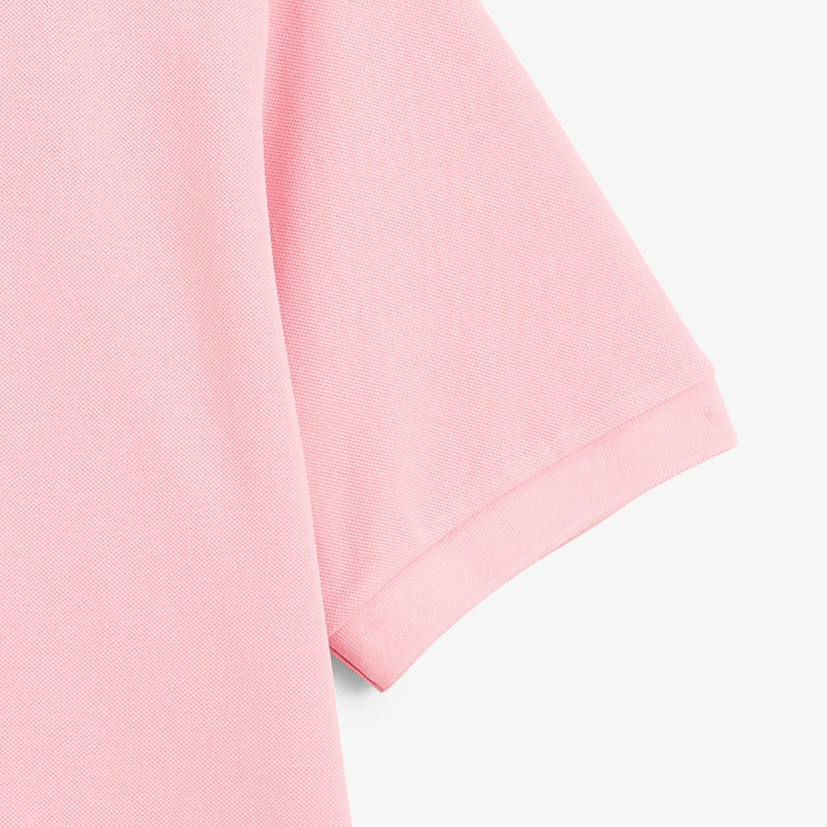 Détail de la manche courte du polo piqué Lucas rose.