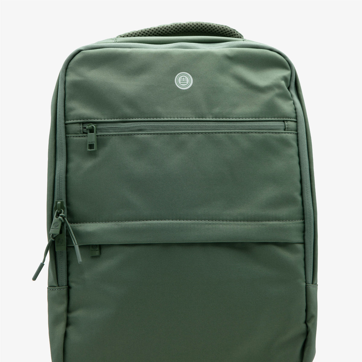 SERGE BLANCO army green Popbag backpack, viewed from the front, with a zippered front pocket and a round logo.