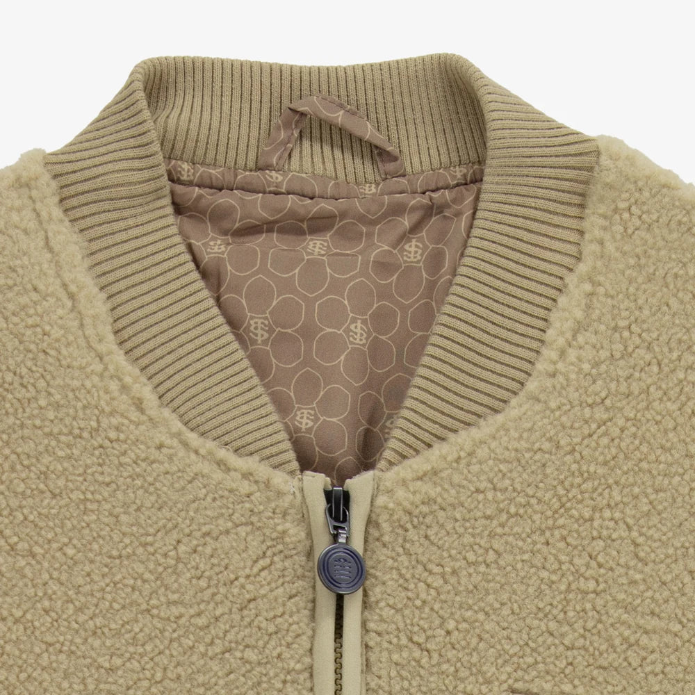 Détail du col et de la doublure du blouson beige Stade Toulousain