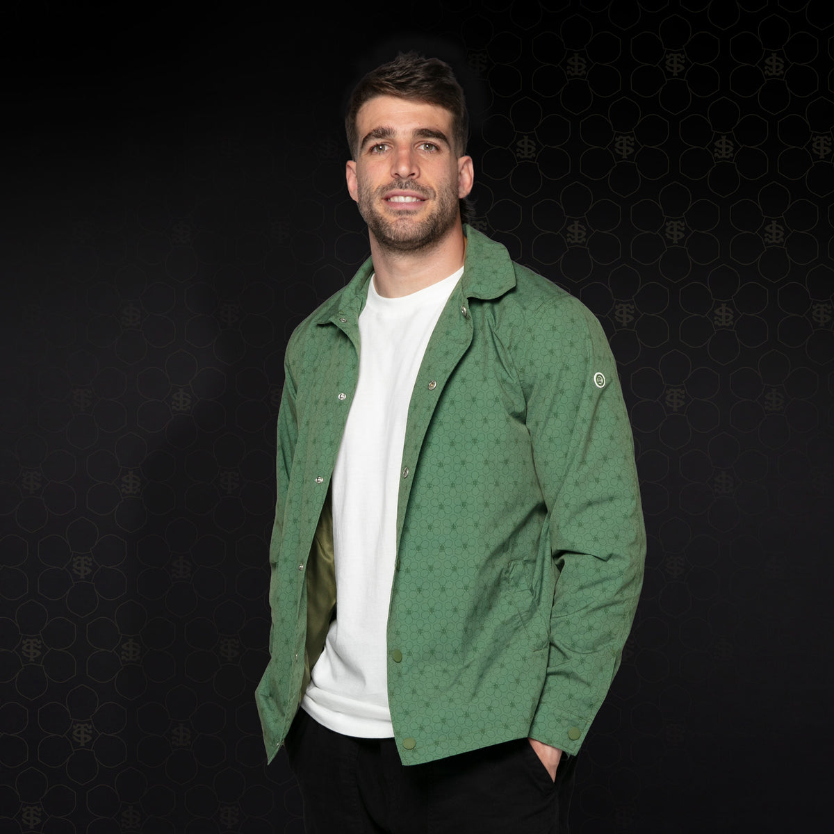 Stade Toulousain “Coach ST” army green work jacket, worn open three-quarters of the way by a model.
