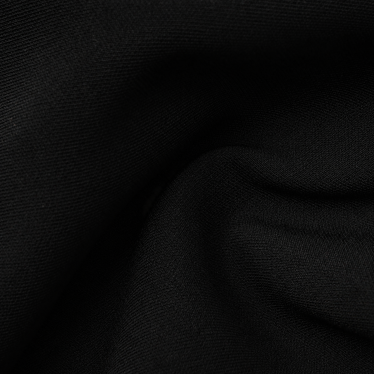Détail du tissu noir de la veste worker Wael stretch.