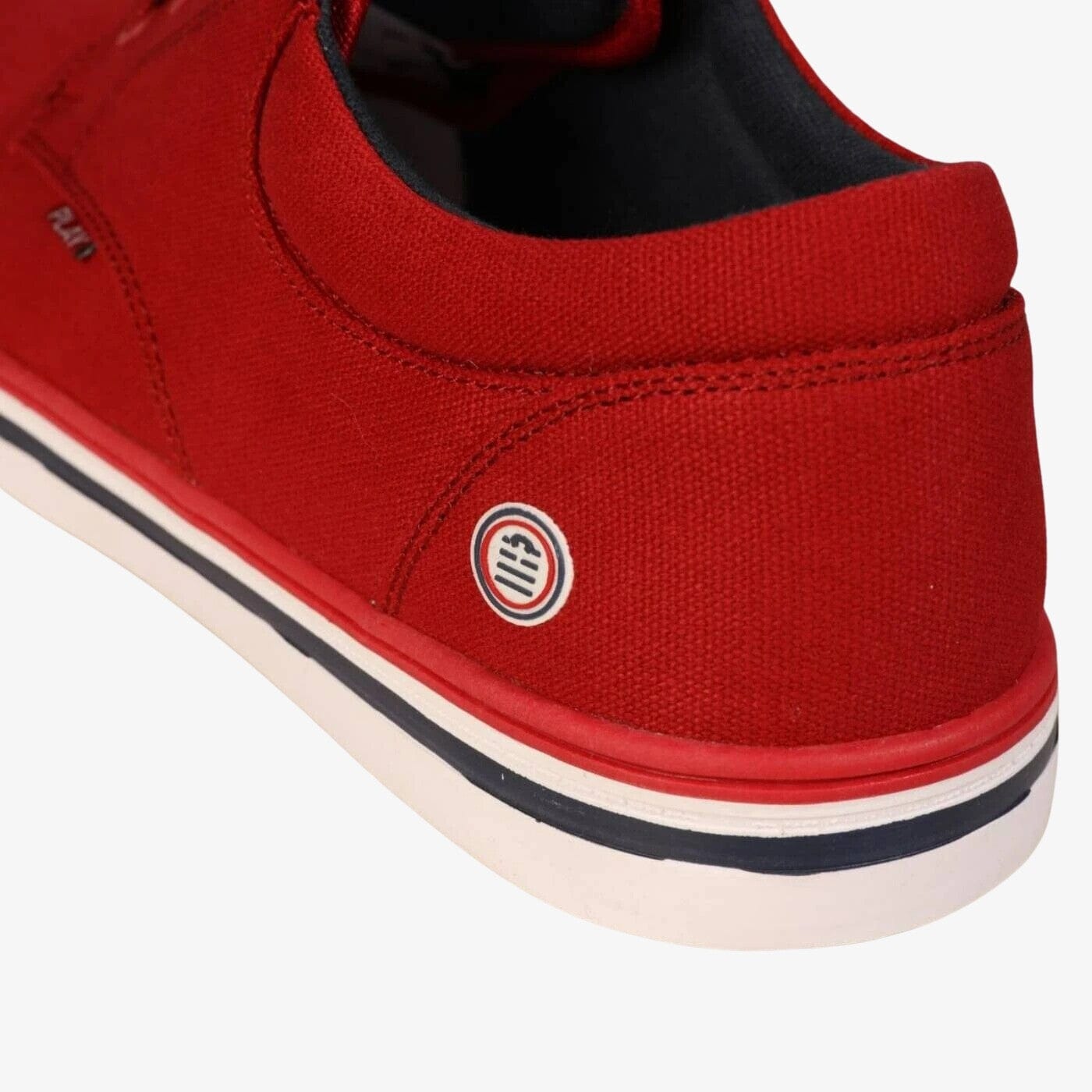 Red canvas tennis shoes