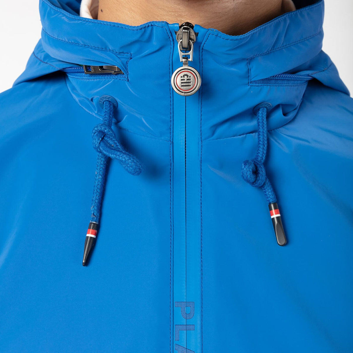 Two-tone green PLAY windbreaker jacket